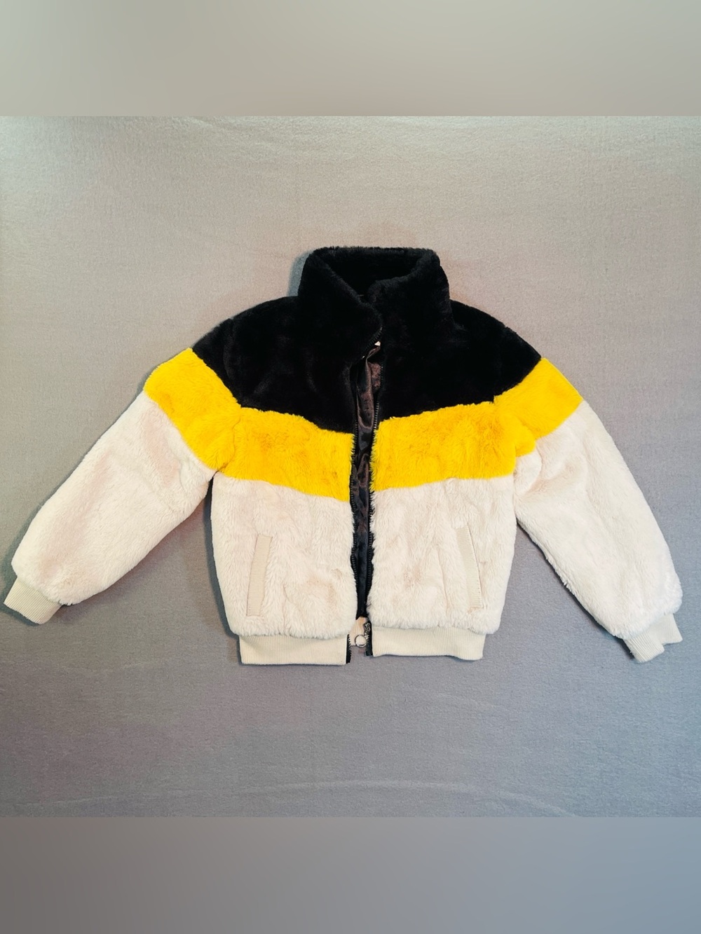 Girls size 14/16 size L color black Faux-Fur Jacket in Black, Yellow & Cream